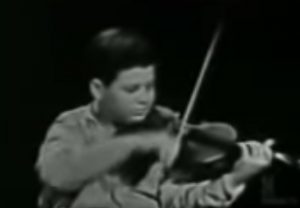 Violinist Itzhak Perman at 13 years old img